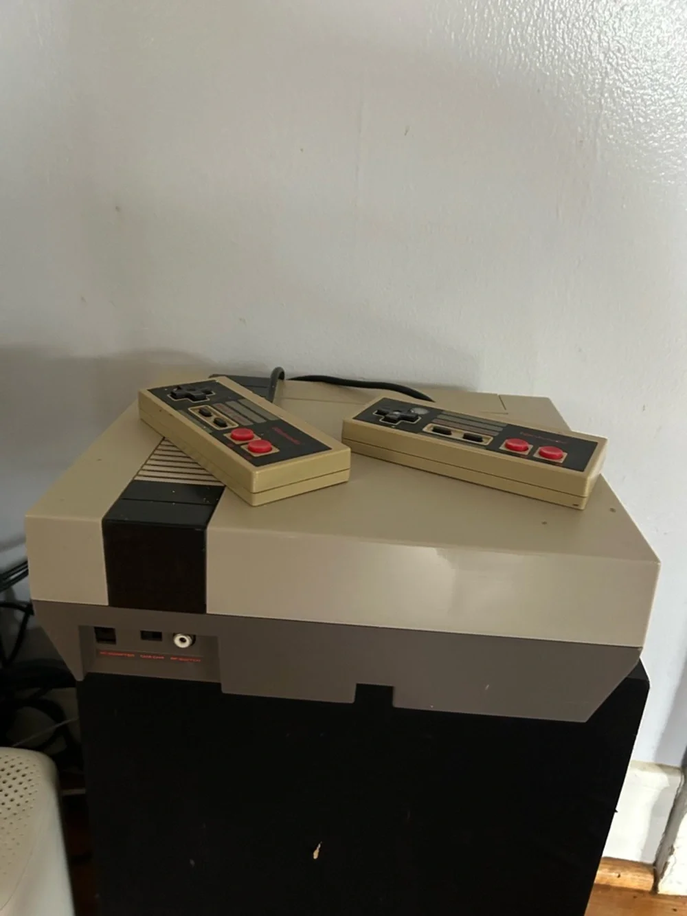 Nintendo NES Console with Cream Case and Red Logo